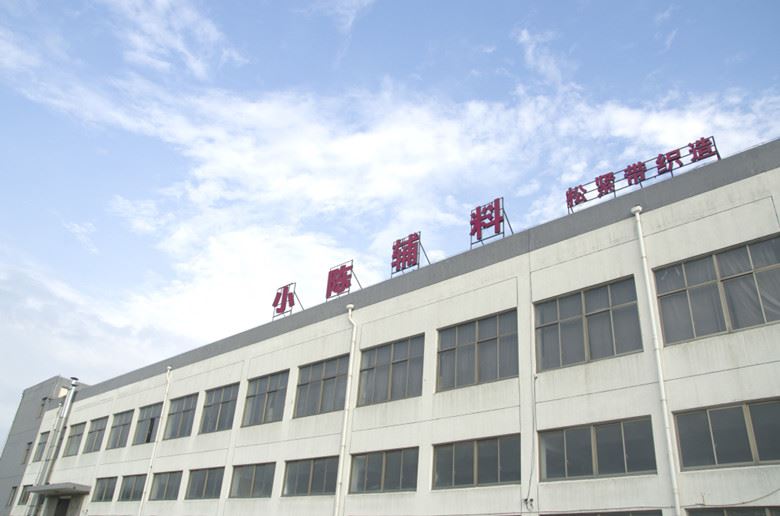 Jiangsu Xiaochen Garment Accessories Co., Ltd. Logo